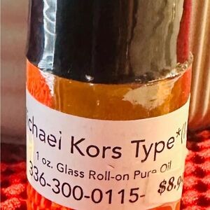 MICHAEL Michael Kors Roll-on Pure Oil - Black and Orange